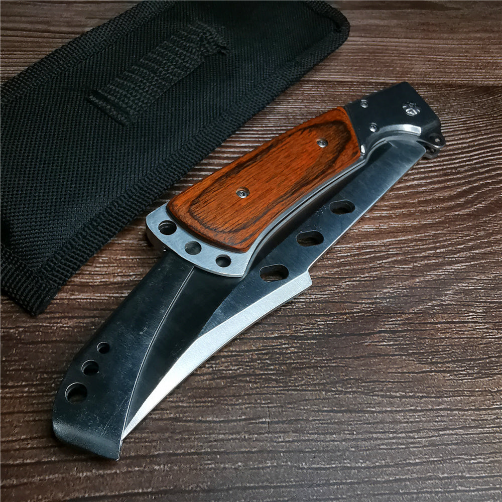 The Artistic Bladesmith's Defender Knife is a premium cutting tool designed for both tactical and everyday use, with a 98mm blade length and 3.5mm thickness.