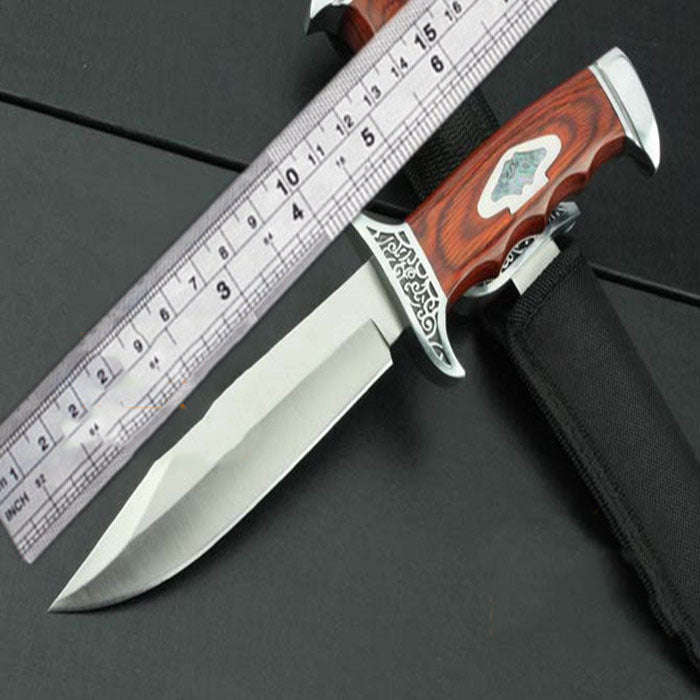 Detailed view of the Artistic Knives stainless steel blade, featuring a sharp edge and a high-quality finish