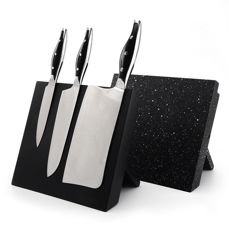 Artistic Knives modern magnetic knife holder with rubber magnet, securely displaying kitchen knives in a contemporary kitchen setting.