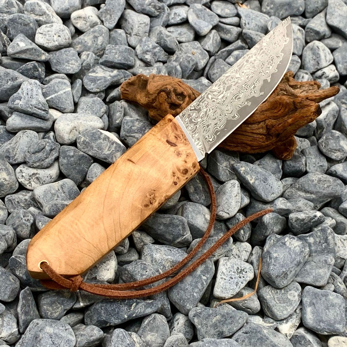 Artistic White Shadow Short Knife in open position, revealing the full length of the Damascus steel blade and the subtle curve of the handle, ideal for everyday carry or outdoor use